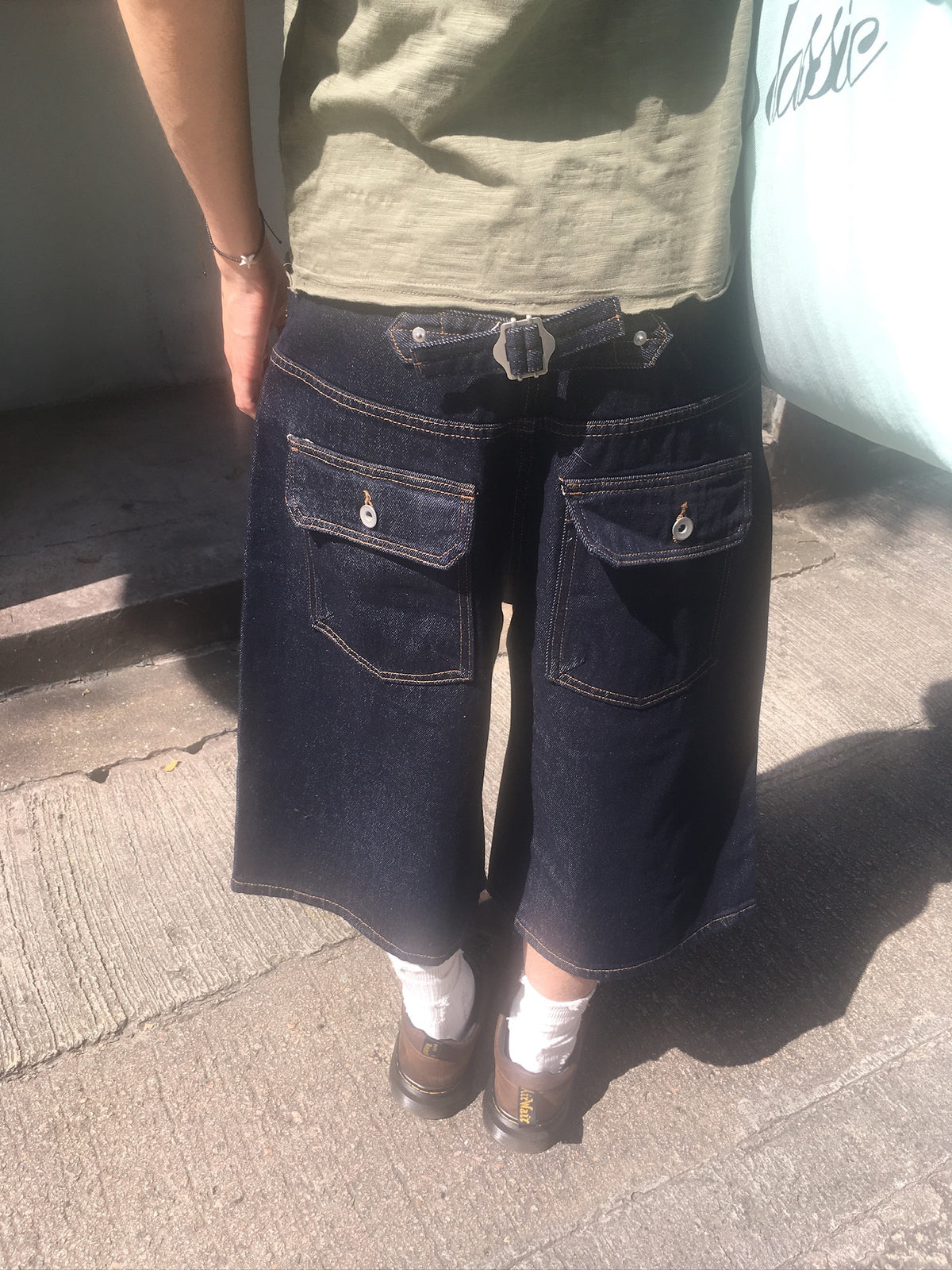 cinch back half raw jeans