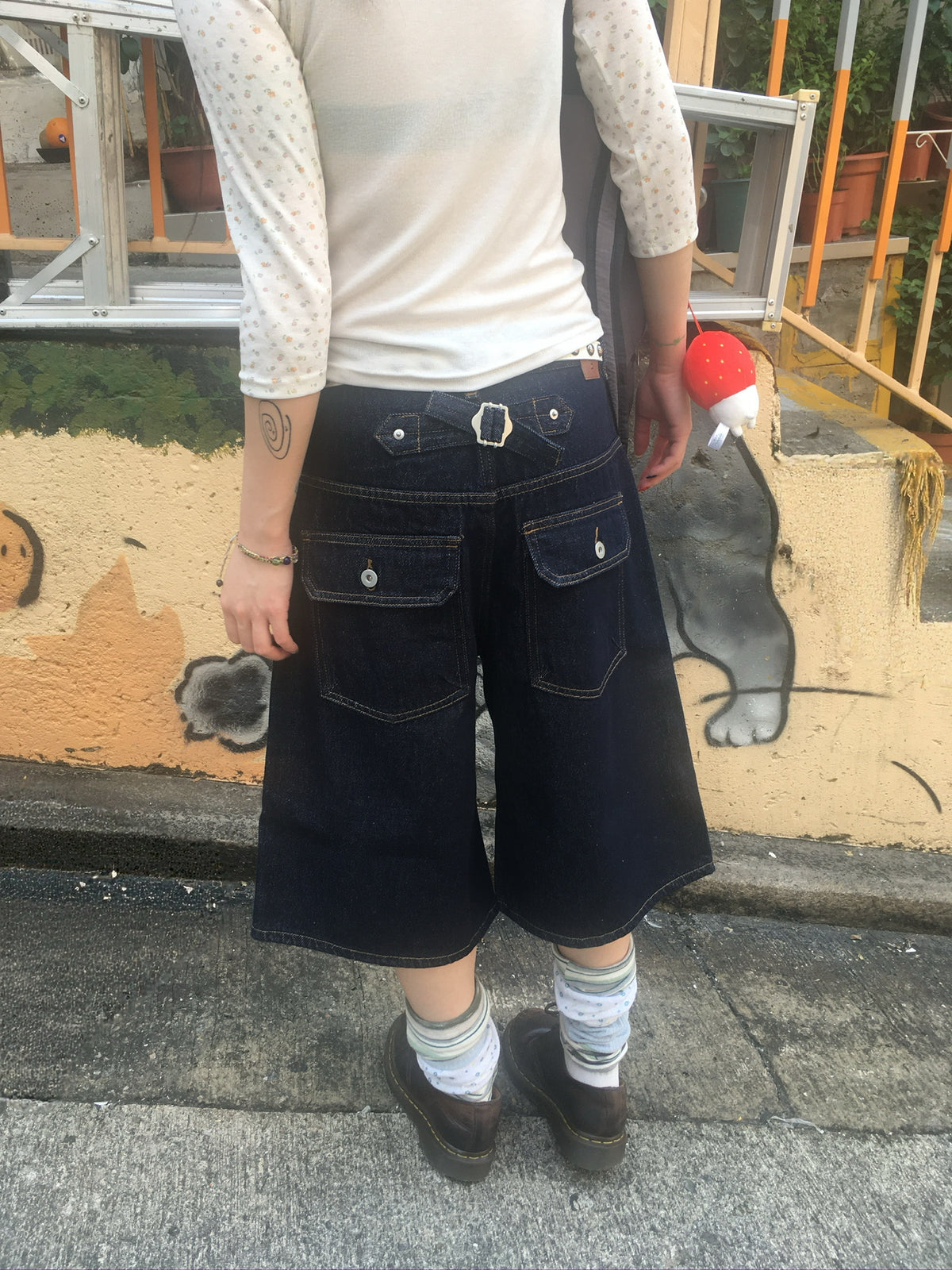 cinch back half raw jeans