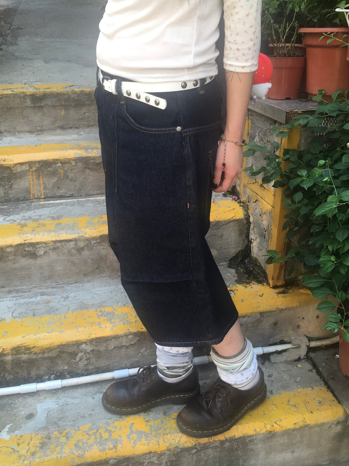 cinch back half raw jeans