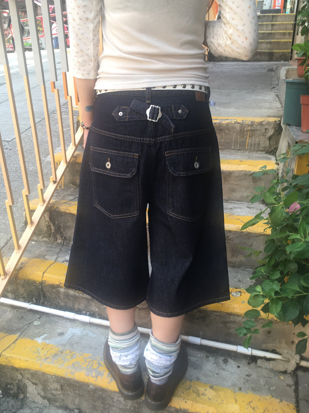 cinch back half raw jeans